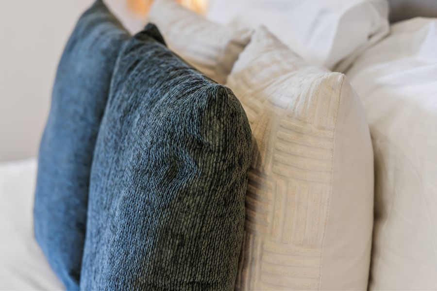 Linen and indigo cushions on the sofa