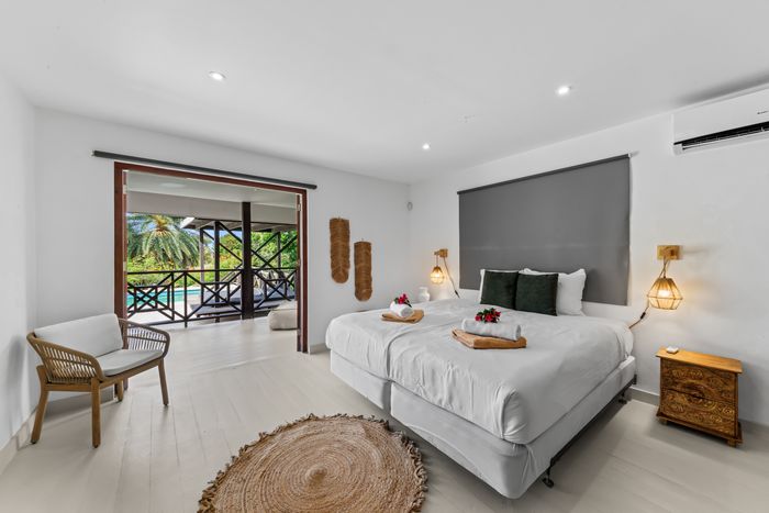 Bedroom with doors onto the veranda